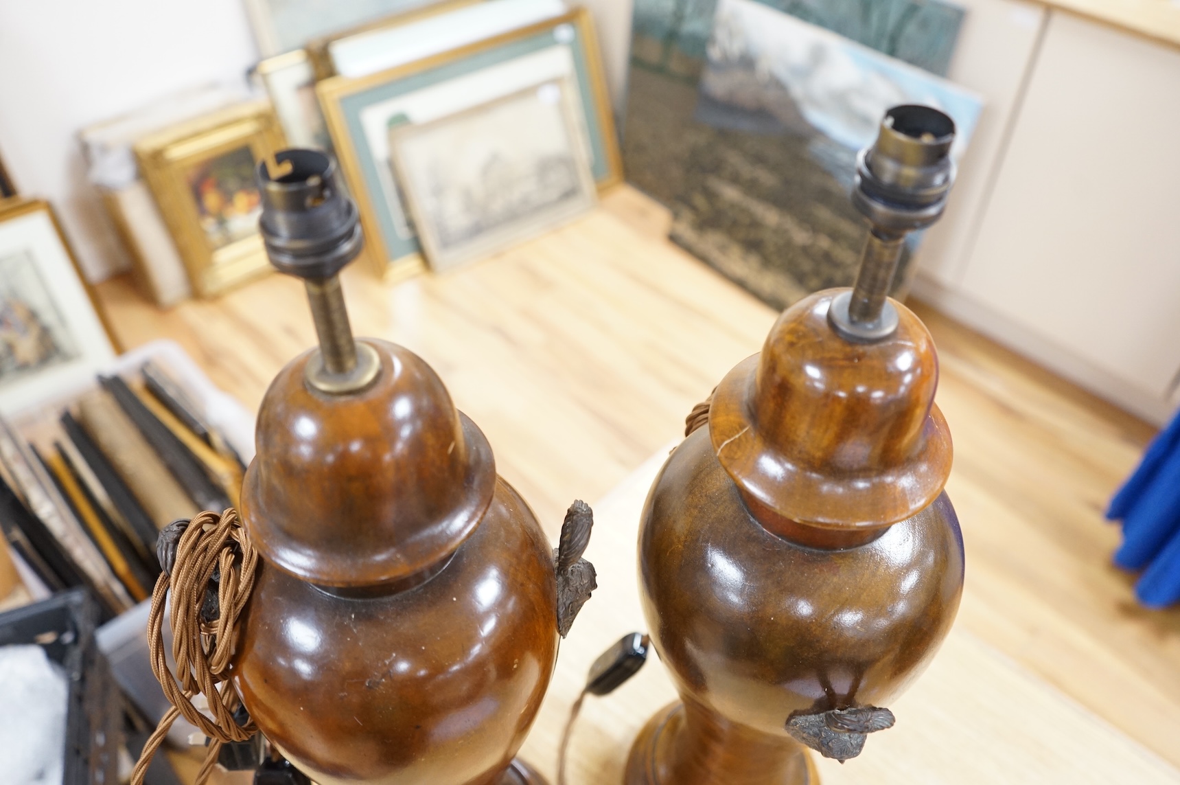 A pair of turned mahogany lamp bases - without shades H 60cm x W 18